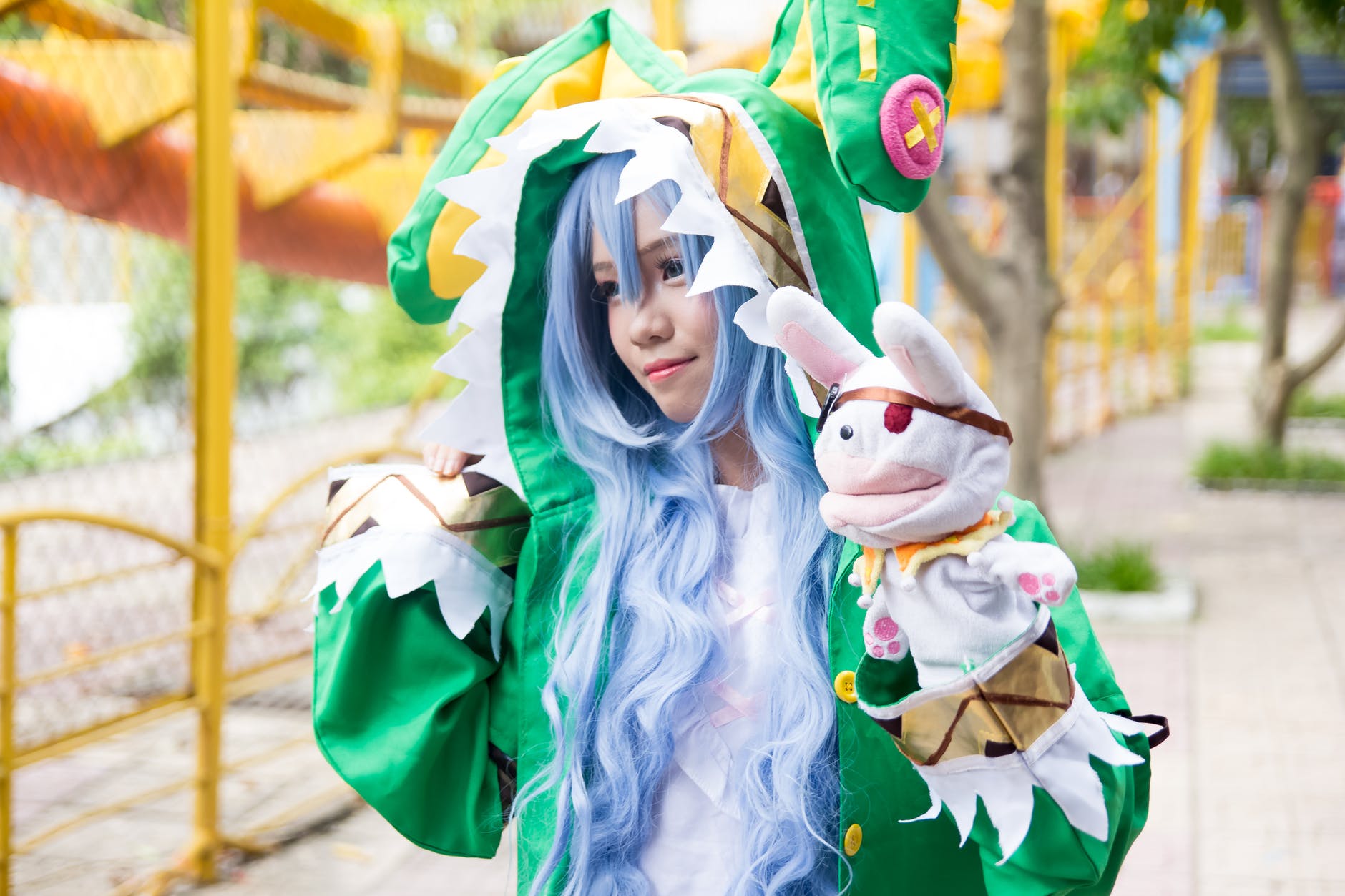 woman wearing green character costume